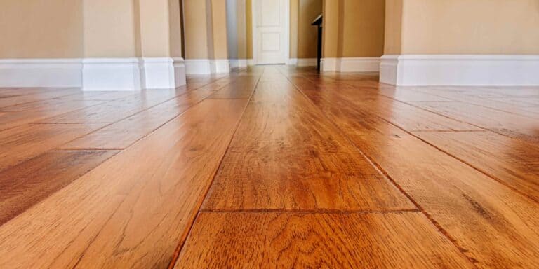 Best Hardwood Floor Polishes By thecleaningmommy September 15, 2021 With the right polish and method, you can restore the shine of your wood flooring. Consider the daily abuse your wood floors take: high heels, pet nails, children’s toys, and moving furniture, to mention a few. Even while wood floors are durable, their polish is vulnerable to scratches and scuffs. Refinishing—the process of completely sanding floors to create a new surface finish—is expensive and should be done only every few decades. However, polishing needing a solution designed particularly for your floors is a simple and affordable method to restore shine, level out flaws, and extend the life of your beautiful hardwood. To get the desired effect, all you need is a flat-head mop with a microfiber cleaning pad and professional wood floor polish in low- or high-gloss sheens. The finish of your flooring, however, determines whether or not you should polish them. Polish will benefit floors with a protective surface, such as a waterproof barrier like urethane, while the wax is required for floors with penetrating finishes like tung oil or untreated wood. Using the incorrect product might result in a variety of issues, such as making the floors excessively slippery, dulling the sheen, and impeding appropriate refinishing in the future. So, before you plunge in and do harm, it’s critical to establish which type of floor you have (Step 1 in this article on how to polish wood floors). This post may contain affiliate links. Full disclosure here. Should You Polish Your Hardwood Floor? How to Choose the Best Hardwood Floor Polish The Best Hardwood Floor Polish Method Wood Polish, Almond Pledge Floor Gloss Liquid Quick Shine Hardwood Floor Polish Howard Products Wood Polish & Conditioner Mop & Glo Multi-Surface Floor Cleaner Bona Hardwood Floor Polish Rejuvenate Professional Wood Floor Restorer Rejuvenate Shine Refresher Hardwood Polish Howard Products RF6016 Restor-A-Finish Orange Glo Hardwood Floor 4-in-1 Hardwood Floor Polish FAQs Best Hardwood Floor Polishes Bottom Line Should You Polish Your Hardwood Floor? Yes. There are several advantages to polishing your hardwood floor. It helps the flooring seem shinier and more appealing. It conceals or treats scratches and scuffs. It protects your floors from damage caused by dogs, vacuums, and over-cleaning. It restores the finishing layer’s protective layer. How to Choose the Best Hardwood Floor Polish When looking for hardwood floor polish, there are several key aspects to consider. Is it possible to use the wood floor polish on other types of floors, such as laminate, vinyl, or tile? Is it capable of doing more than simply polishing? Perhaps it also serves as a wood floor cleaning and filler for scratches. Before you choose a hardwood floor polish, be sure it has a strong enough cleaning power. It could also come in helpful for other jobs. The greater the concentration, the greater the area that the floor polish may cover. You’ll want something focused if you have vast rooms or a larger home. It will be more cost-effective to use the product. Polyurethane, a hazardous substance, is occasionally included in the formulation of hardwood floor polishes. It has the potential to induce respiratory distress. As a result, I would not suggest this product, especially if you have children or pets. On the market, there are several products that do not include polyurethane. I’ll tell you the toxicity level of each product in this guide. However, if you want to go fully green, you may manufacture your own hardwood floor polish out of the water, olive oil, vinegar, and lemongrass essential oil. It may, however, be less effective than the items I recommend. Floor polishes contain a natural fragrance that varies based on the components. However, if you like a certain smell, I have a few suggestions for you. Always check to see whether the wood floor polish will work on your particular wood flooring. There are several types of wood flooring, including engineered, sealed, unsealed, solid wood, reclaimed wood, and others. Check the product description to ensure that it is suitable for your floor type. The finest hardwood floor polishes differ in price, but there are several low-cost choices. Although a bottle may be purchased for less than $7, I recommend comparing the price per ounce. These little bottles will get increasingly costly over time. If you’re ready for a challenge, go wild with your nail paint selection! However, many of me just want something basic and easy to use. To discover how to apply the polish, read the directions on the bottle. Make sure you have the necessary equipment to effectively apply the polish. Finally, determine whether the floor polish will leave a residue. Some manufacturers, such as Bona, claim that their products do not leave a residue when you polish wood floors. I urge that you read actual customer reviews to discover what they have to say about the subject. If there is any residual residue, you may wipe it away with a soft cloth once the floors have dried. The Best Hardwood Floor Polish I spent many hours studying consumer reviews, professional recommendations, and the items themselves. With this information, I’ve compiled a list of the top ten hardwood floor polishes on the market. Method Wood Polish, Almond Check out the Method Wood Polish with almond flavyour if you want a glossy and fragrant finish. It has a deep, nutty aroma that is extremely comforting! It’s not too sweet, and it doesn’t linger. Customers adore this one-of-a-kind perfume, which many describe as smelling like a cake or pastry. Yum. This is also an excellent polisher for wood floors. It also works on wood furniture and cabinets. It gives your floors a streak-free sheen by needing plant-based oils and polishers. It comes in a convenient spray container made of recycled and recyclable plastic, making the application simple. The Method Wood Polish will bring out the inherent beauty of your hardwood flooring. Pledge Floor Gloss Liquid On a tight budget yet still want gleaming floors? Not an issue. The Pledge Floor Gloss Liquid is a fantastic product that costs less than $10. When you apply this polish, your floors will appear brand new again. It is suitable for use on sealed wood floors, laminate flooring, and no-wax floors. This should not be used on unsealed surfaces. It has a protective glossy finish. As a result, high-traffic areas in your home are safeguarded. Scuff marks, scrapes, and filth will no longer be tolerated. If you want gleaming flooring, this is an excellent option. It gives flooring a gleaming sheen. Customers are also utilizing it to make cosplay outfits, scale models, and wooden furniture. Quick Shine Hardwood Floor Polish Quick Shine hardwood floor polish is made from pure, natural, plant-based carnauba. Aluminum, ammonia, formaldehyde, scent, paraben, phthalate, and gluten are all absent. It was recognized by the EPA as a safer alternative product. If you want a more natural alternative for wood floor polish, I recommend this one. The Quick Shine polish restores the color richness and inherent attractiveness of your hardwood flooring. Make them more durable, whether they’re new or old, needing this product. It creates a protective layer, fills in minor scratches, and improves the overall appearance of your flooring. It dries to a high shine in 30 minutes after being applied with a floor mop in uniform strokes. After that, it is completely safe for your children and dogs to return to the room. Howard Products Wood Polish & Conditioner If you have dogs, you are probably aware of how they’re running around may damage your hardwood flooring. You’ll probably need to polish the floors more frequently but need a pet-safe solution. This is when Howard Products wood polish & conditioner comes in handy. While needing this product, keep your pet out of the room. Also, avoid breathing vapors and fumes. However, once the fragrance has been vented, it is okay for your dogs, cats, rabbits, horses, or whatever to return to the room! This is also a wonderful idea for pet owners because it can be used on furniture. Mop & Glo Multi-Surface Floor Cleaner Hardwood is unlikely to be the sole type of flooring in your home. I propose the Mop & Glo multi-surface floor cleaning as a multifunctional hardwood floor polish. It cleans, polishes, and preserves floors made of hardwood, vinyl, marble, linoleum, ceramic, no-wax, and tile. As a result, your entire home may be cleaned, polished, and protected against Itness and scratch marks. It contains the equivalent of three household cleaning products in one. It then polishes your floors, making them gleam in the light. Finally, it protects your flooring from regular Wear and tears such as furniture, pet, and shoe scratches. Your floors will also be protected against food and drink spills, as well as plant leaks. When needing this detergent, well not smell ammonia or bleach. In fact, it even leaves a pleasant mint aroma behind, leaving your house smelling fresh and clean! Bona Hardwood Floor Polish Some individuals like a more matte finish, while others want a high gloss. If this describes you, the Bona Hardwood Floor Polish is something you should consider. Prepare for a stunning makeover when needing this product to polish wood floors. This will make your floors sparkle like no other. After filling up scratches, it also creates a protective coating. So, if you have dull floors, this is the remedy. One bottle is enough to cover 500 square feet of flooring. It is suitable for use on unwaxed, unoiled, or polyurethane-finished wood floors. This product is also Greenguard certified, which means it emits minimal levels of indoor chemical emissions, making it a safer choice for you and your family. Rejuvenate Professional Wood Floor Restorer You may still get your engineered hardwood floors refinished! On engineered hardwood, as well as wood and hardwood floors, use the Rejuvenate Professional wood floor restorer. To get a glossy sheen on your floors, all you need is one application and one hour of your time. This product polishes the floor, restores the glossy shine, and preserves it. If your floors get a lot of foot activity, this is an excellent option. Between applications, it will protect the flooring from further harm. The product promises to fill up scratches, however, users have discovered that it does not. Keep it in mind. It is, however, a non-toxic, polyurethane-based solution that covers up to 525 square feet. Rejuvenate Shine Refresher Hardwood Polish Hardwood flooring, however, is easily scratched. Whether it’s from moving furniture, having active pets, or even vacuuming. The Rejuvenate Shine Refresher hardwood polish is your best choice for removing scratches. It is intended to erase scratches from hardwood floors, as well as linoleum, tile, vinyl, and other floor types, in an instant. This is accomplished by filling in the scratches and then covering them with a protective layer. Finally, it seals the flooring and protects them from UV radiation, which may cause the hardwood to fade. With this product, your floors will appear as good as new ones! Allow it to dry completely before stepping across as normal. Otherwise, you risk scratching the protective layer. If this happens, sand the floor down, vacuum it, use a wood floor cleaner, then reapply the product. Howard Products RF6016 Restor-A-Finish The Howard Products Restor-A-Finish is an excellent solution for dark flooring! It is available in a variety of hues. Dark walnut, dark oak, ebony brown, and mahogany are all possibilities for dark flooring. This product not only polishes floors, but also removes small scratches, blemishes, and abrasions. As a result, your floors will appear a million times nicer than they did before! It is really simple to use. Simply apply and remove with a microfiber cloth. It restores your floors without removing the original finish, allowing you to keep your floors ultra-protected. You can keep the antique look of your flooring or other wood furniture by needing this polish. However, heat rings, water damage, UV fade, oxidation, and smoke damage are all eliminated. I do suggest that you use this product while laying a protective mask and gloves. Once applied, exit the ventilated room until the odors have dissipated. While this product is in use, keep pets and children away from it. Orange Glo Hardwood Floor 4-in-1 Keep away from children… It includes solvent plasticizers and wax emulsions, and if ingested, it is toxic. A four-in-one floor product? Yes, please! If you’re searching for hardwood floor polish and cleaning, the Orange Glo Hardwood floor is a fantastic option. This tool allows you to multitask. It cleans, polishes, protects, and revitalizes your flooring. You no longer need to follow four lengthy stages because this product does all of the hard work for you. The product directions suggest applying this once a month to maintain your flooring in good condition. Some consumers, however, only use it every several months. Keep an eye on your flooring to see when they need to be refinished. First and foremost, this solution removes dirt and filth. Then it fills in scratches, forms a water-resistant layer, and leaves a long-lasting shine. Hardwood Floor Polish FAQs How To Care For Hardwood Floors? Sweep your floors on a daily basis. This removes surface dirt and dirt from your floor, which can discolor and damage it. Vacuum the floors once a week. Because of the powerful suction, you should not vacuum hardwood floors every day, but once a week. Mop once a month. Because hardwood floors can’t withstand a lot of moisture, keep this to a minimum. Don’t It the floors either; instead, use a gentle mop. Thoroughly cleaning: It is not necessary to deep clean hardwood floors on a regular basis. I recommend cleaning the floors once a month or if they appear only filthy or dull. There are several natural ways to thoroughly clean hardwood floors. One method is to simply combine vinegar and water in a spray bottle and sprinkle your floors while mopping. How Do I Make My Hardwood Floors Shine? Your floors will sparkle if you use one of the top hardwood floor polishes! However, in addition to these applications, keep the following suggestions in mind: Spills should be cleaned up right away. SIep on a daily basis. Damp-mop with a wood floor cleaner on a regular basis. To avoid streaky flooring, buff dry with a microfiber cloth. Why Does My Hardwood Floor Look Cloudy? Cloudy hardwood floors are seldom appealing to the eye. Here are some of the reasons why your flooring may appear foggy or hazy: You didn’t use enough wood floor polish. Always, always, always follow the manufacturer’s directions to the letter, and be patient. You stepped on the floors before they Are completely dry. You did not utilize high-quality cleaning supplies. You may have chosen a product that did more damage to your flooring than good. That is why I am here to assist. You did not use the proper floor product. Use oil-based products, for example, on polyurethane-sealed wood. They have the ability to infiltrate and destroy your flooring. You waxed the floors even though they didn’t require it. How Do I Remove Dull Film From Hardwood Floors? If you have a dull film or a hazy finish, it is possible to remove it. You might begin by needing steam cleaning. However, this technique should only be used on sealed flooring. Steam cleaning is a non-chemical method for removing haze or film from hardwood floors. I recommend moving rapidly so that steam does not accumulate in regions of the floor for an extended period of time. You may also use distilled white vinegar to clean. Combine one cup of vinegar and one gallon of boiling water. To remove the dull coating, gently wipe the hardwood floors in circular motions with a towel. After you’ve finished, wipe down the floor with a clean, wet towel to eliminate any vinegar residue. Finally, use a cloth to wipe the floor dry. Best Hardwood Floor Polishes Bottom Line When you keep your hardwood flooring in pristine shape, you may dazzle your guests. That includes keeping them clean, treating them, and, of course, polishing them. You can get the best hardwood floor shine for your house with your top hardwood floor polish suggestions. I recommend the Pledge Floor Gloss Liquid if you’re on a tight budget. Check out the Rejuvenate Shine Refresher if you’re looking to get rid of those ugly scratches. Finally, if you prefer a more natural choice, you could choose the Quick Shine Hardwood Floor Polish.