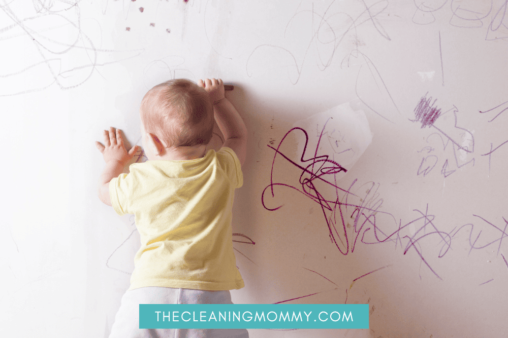 Toddler writing on walls with pen