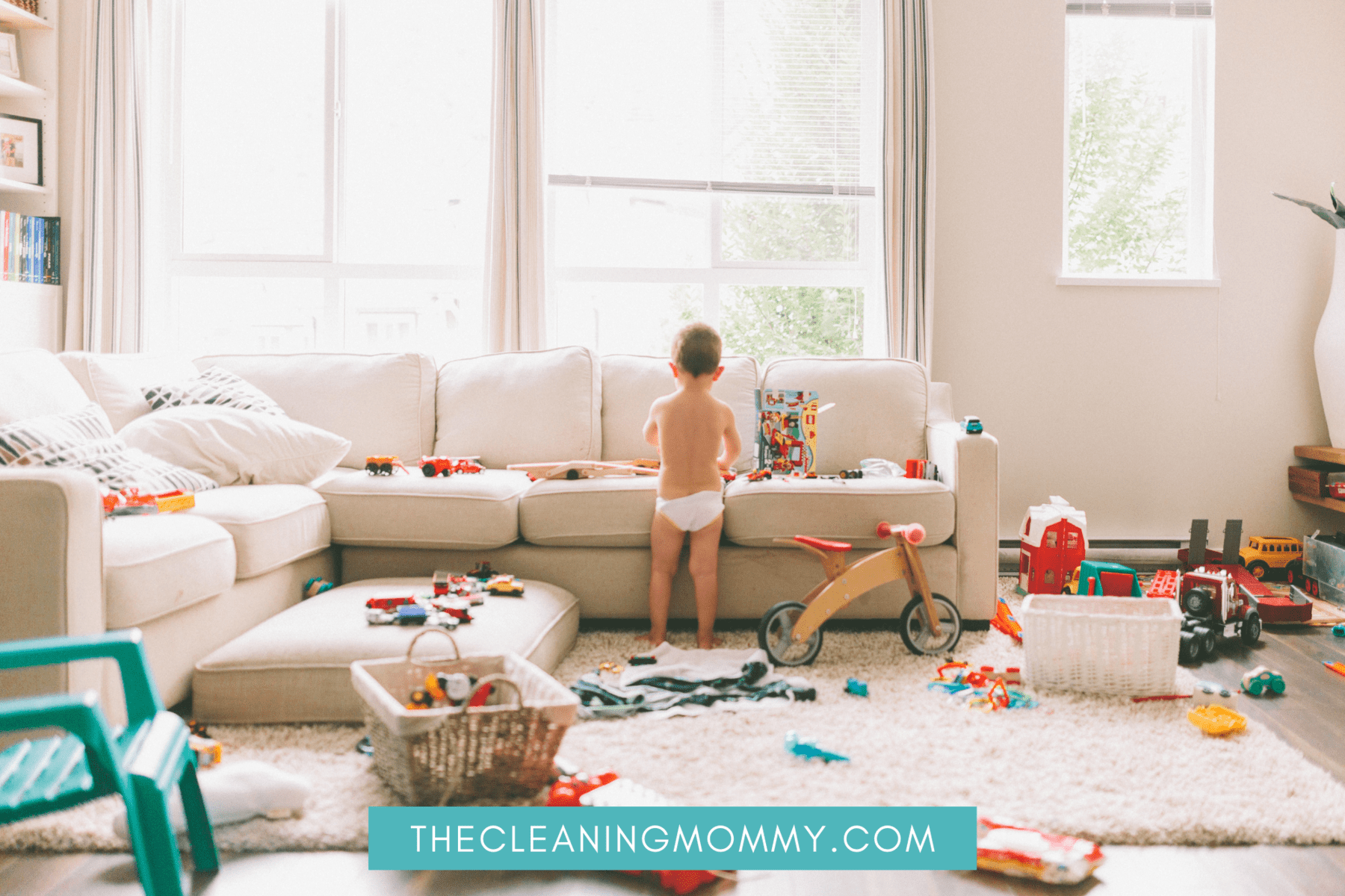 Messy house with baby in diapers
