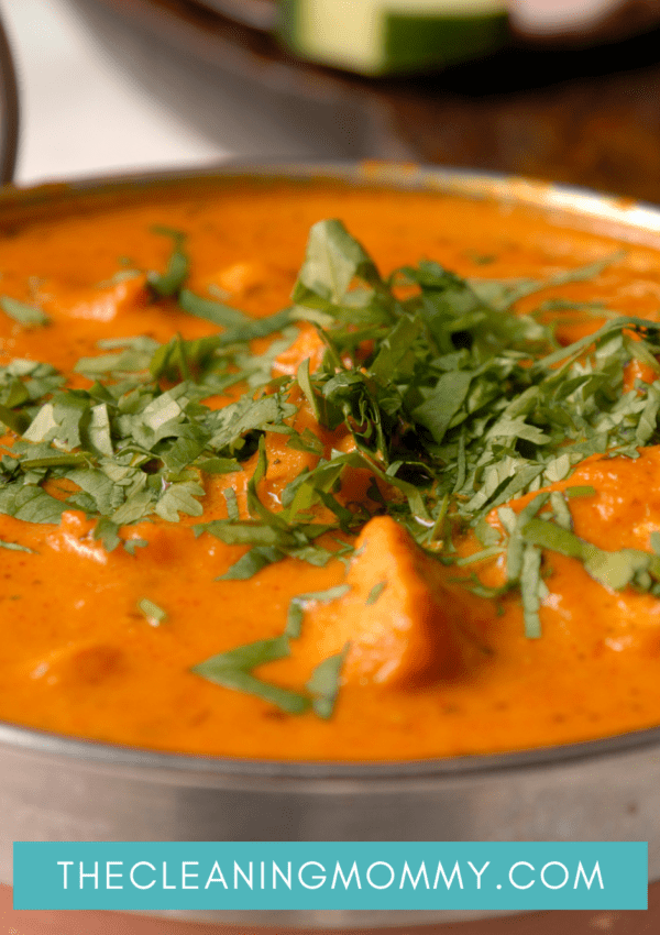 Red curry in stainless steel bowl